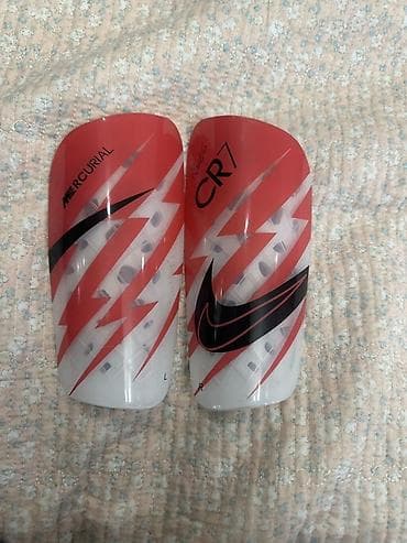 Электр транспорту: Футбольные щитки Nike Mercurial CR7. - Серия CR7 с фирменной графикой — 1