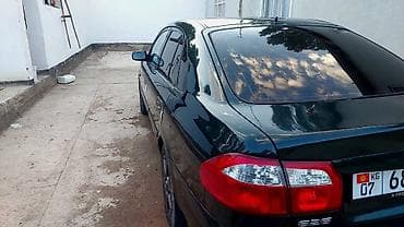 gac s9: Mazda 626: 2000 г., 1.8 л, Механика, Бензин, Хэтчбэк — 4