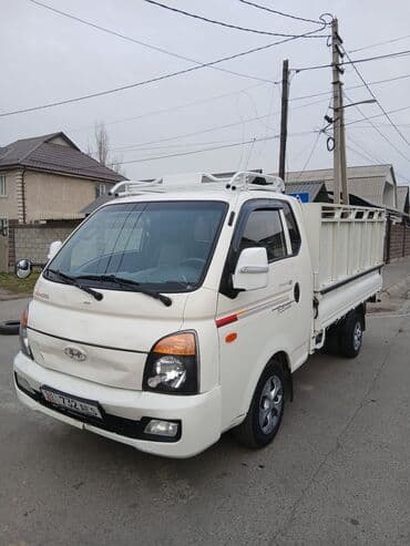 23.5 25 шины бу на фронтальный погрузчик: Hyundai Porter: 2018 г., 2.5 л, Механика, Дизель — 1