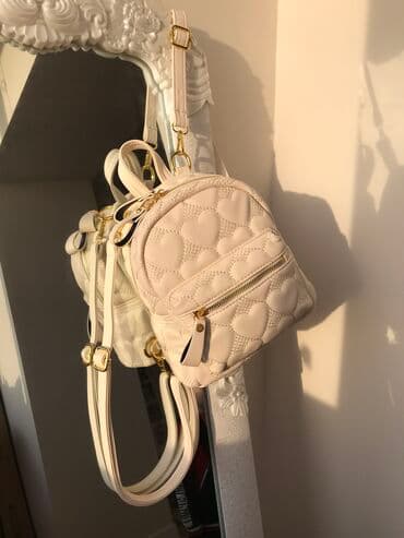 Рюкзаки: Фактурный рюкзак из мягкой эко-кожи Яркая и акцентная фурнитура — 1