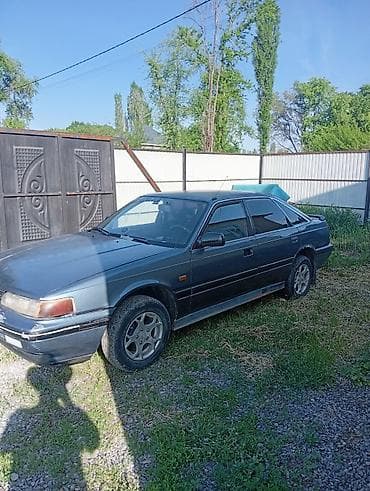 ом 606: Mazda 626: 1988 г., 2 л, Механика, Бензин — 1