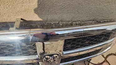 удаление вмятин: Решетка радиатора Dodge Оригинал — 1