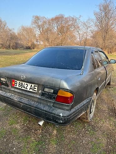 тез арада: Nissan Primera: 1991 г., 1.6 л, Кол менен иштөөчү, Бензин, Седан — 3