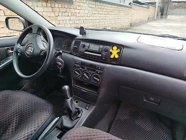 авто чехолдор: Toyota Corolla: 2004 г., 1.4 л, Кол менен иштөөчү, Бензин, Хетчбек — 6