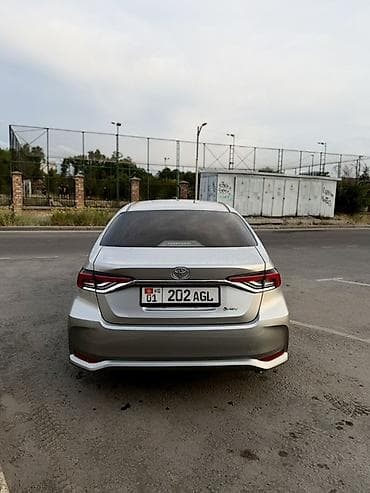 byd e2 2023: Toyota Corolla: 2023 г., 1.8 л, Вариатор, Гибрид, Седан — 6