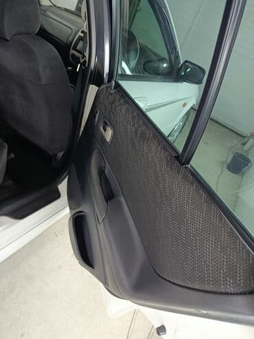 глушитель гольф 2 1.8 бензин: Mazda Familia: 2001 г., 2 л, Автомат, Бензиновая, Универсал — 7