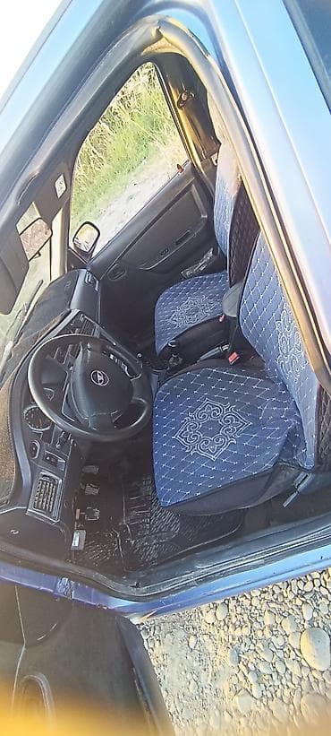 Унаа: Chevrolet Nexia: 2008 г., Кол менен иштөөчү, Бензин, Седан — 8