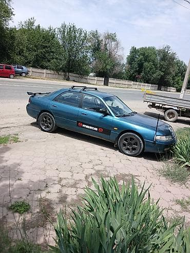 demio бампер: Mazda Cronos: 1993 г., 2 л, Автомат, Бензин, Седан — 4