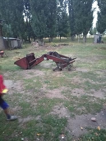 Бугорообразователи: Кун Фронтальный погрузчик-навеска для трактора - Тип: передний — 1