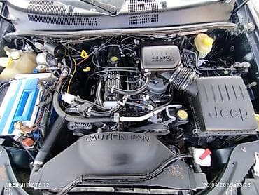 меняю на крайслер: Jeep Grand Cherokee: 2002 г., 4 л, Автомат, Бензин, Внедорожник — 5