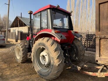 продается электро мото и скутер мотоцикл: Трактор колёсный, красный, с закрытой остеклённой кабиной. Основные — 2