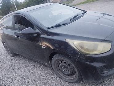 арзан машине: Hyundai Solaris: 2011 г., 1.4 л, Кол менен иштөөчү, Бензин, Хетчбек — 6