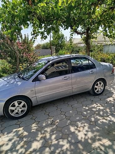 чери арризо 8 салон: Mitsubishi Lancer: 2006 г., Седан — 2