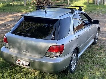 что за машина: Subaru Impreza: 2004 г., 1.5 л, Автомат, Газ, Седан — 6