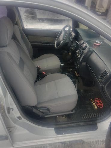 спартивные машины: Hyundai Getz, 5‑дверный хэтчбек, серебристый цвет. Кузов и экстерьер — 5