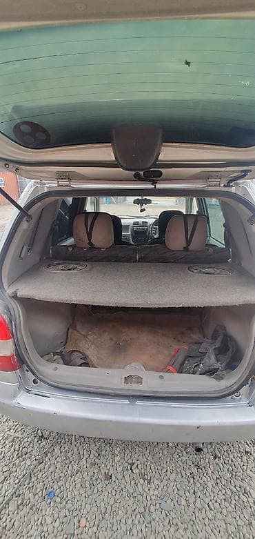 привод демио: Mazda Demio: 1997 г., Бензин, Универсал — 7