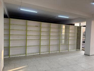 Торговые стеллажи настенные модульные - Конструкция: длинная линейка