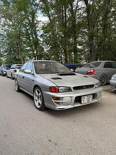 Унаа сатуу: Subaru Impreza: 1994 г., 2 л, Кол менен иштөөчү, Бензин, Седан — 3
