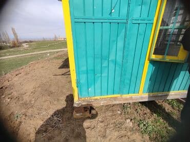 оборудования для магазина: Киоск бирюзового цвета с желтыми акцентами, оснащенный большими — 5