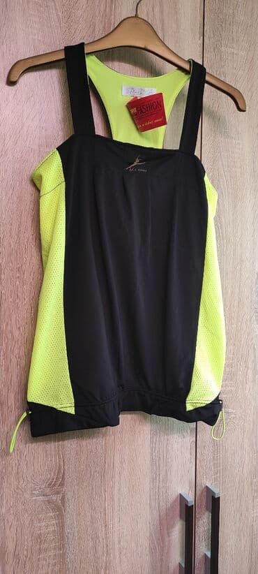 купить спортивный костюм женский недорого от производителя: Продаётся новая женская майка для спорта, размер S. Двойной подклад — 1