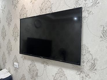 tcl c755 купить: Телевизор TCL, диагональ приблизительно 40–43". Тонкие рамки, корпус — 1
