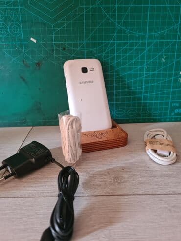 Автоэлектроника: Samsung GT-S7220, Б/у, 8 ГБ, цвет - Белый, 2 SIM — 1