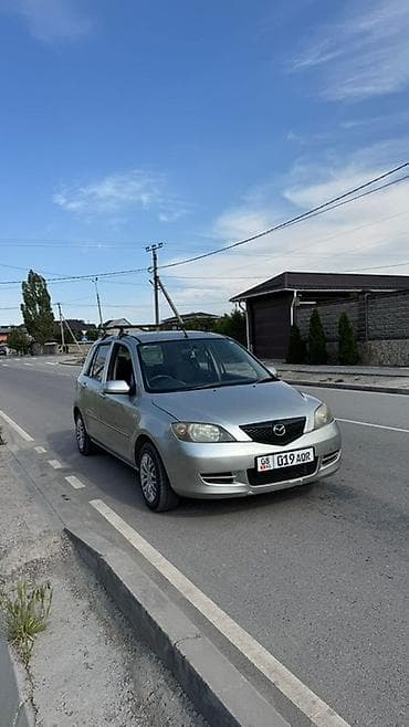 Mazda Demio: 2004 г., 1.5 л, Автомат, Бензин, Хэтчбэк