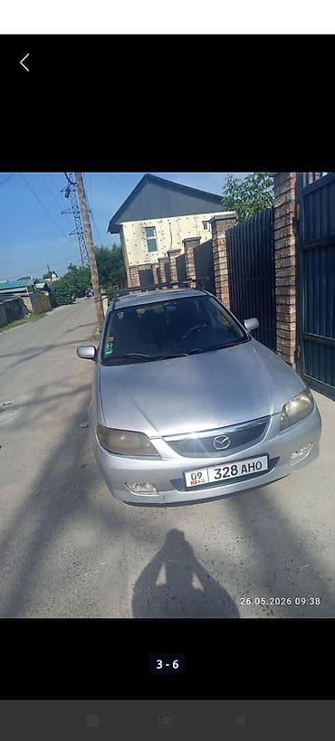 kirgiz auto: Mazda 323: 2002 г., 1.6 л, Механика, Бензин, Хэтчбэк — 1