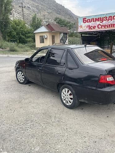 Daewoo Nexia: 2010 г., Механика, Бензин, Седан — 5