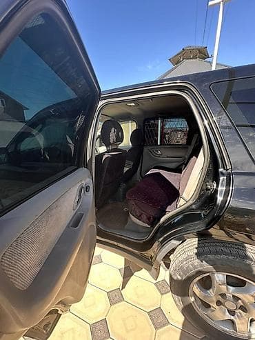 Mazda Tribute: 2001 г., 2 л, Механика, Бензин, Жол тандабас — 2