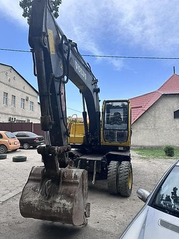 volvo ew160: Экскаватор, Volvo, 2001 г., Колесный — 1