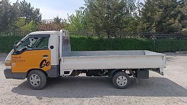 грузовой авто: Грузовой бортовой малотоннажник (кабина над осью), задний привод — 4