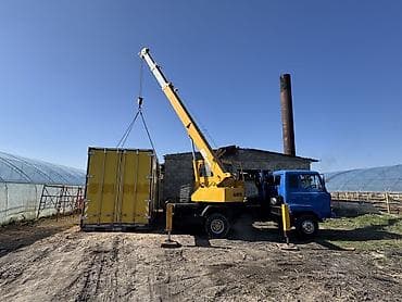 токмок кран: Манипулятор, Komatsu — 2