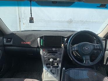 насос от прикуривателя: Ворсовые Накидка на панель Subaru, цвет - Черный — 1