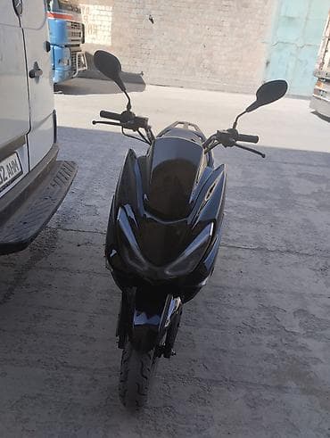 скутер на воду: Скутер MANAS, черный - Тип: городской скутер/мопед - Двигатель — 2