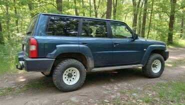 Nissan Patrol: 2009 г., 3 л, Механика, Дизель, Внедорожник — 1