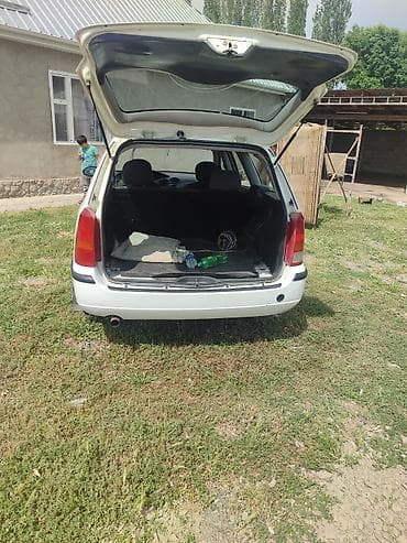беларус 82 1 трактор: Ford Focus: 2002 г., 1.8 л, Механика, Универсал — 4