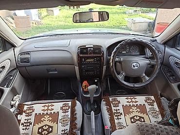 keyless go: Mazda Capella: 2000 г., 1.8 л, Автомат, Бензин, Седан — 3