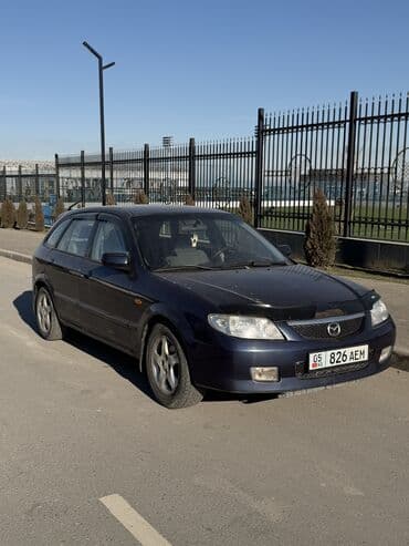 Mazda 323: 2002 г., 1.6 л, Механика, Бензин, Хэтчбэк