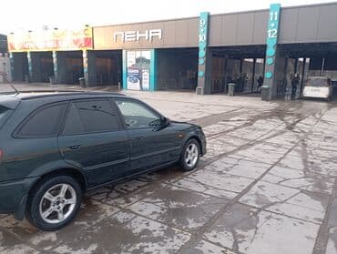 купить держатель номера на авто: Mazda 323: 2003 г., 1.6 л, Механика, Бензин, Хэтчбэк — 6