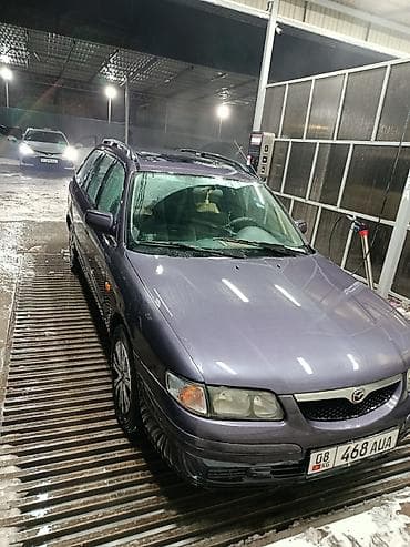 Унаа сатуу: Mazda Capella: 1998 г., 2 л, Кол менен иштөөчү, Бензин, Универсал — 5