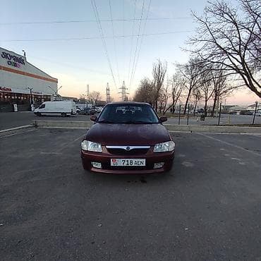 Продажа авто: Mazda Familia: 1998 г., 1.5 л, Механика, Бензин, Хэтчбэк — 5