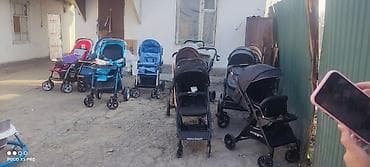 Прокат детских карнавальных костюмов: Детские прогулочные коляски разных моделей и расцветок распродажа - — 3