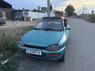 1992: Mazda 121: 1992 г., Механика, Бензин, Седан — 1