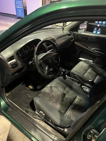 34 bwm: Mazda 626: 1998 г., 1.8 л, Механика, Бензин, Седан — 7