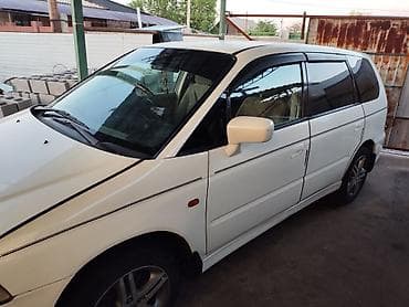 а 8: Honda Odyssey: 2001 г., Универсал — 2