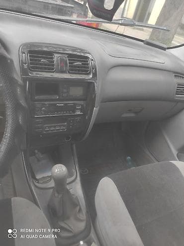 ли 9 авто: Mazda Capella: 2000 г., 2 л, Механика, Бензин, Универсал — 6