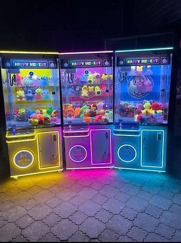 Игровой автомат «кран-машина» (claw machine) серии Happy Moment. -