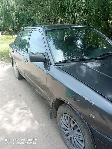 gac s9: Mazda 323: 1990 г., Механика, Бензин, Седан — 5