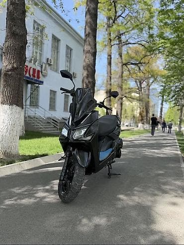dio 27: Скутер городского типа - Агрессивный дизайн кузова в чёрном цвете — 2